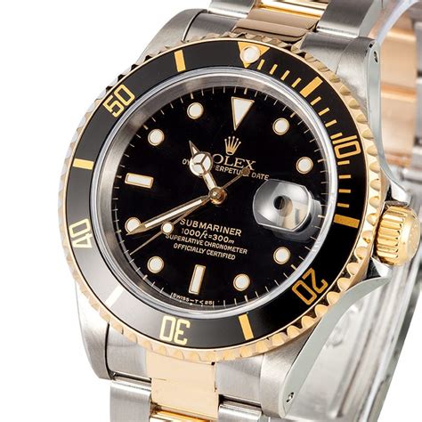 rolex black face gold